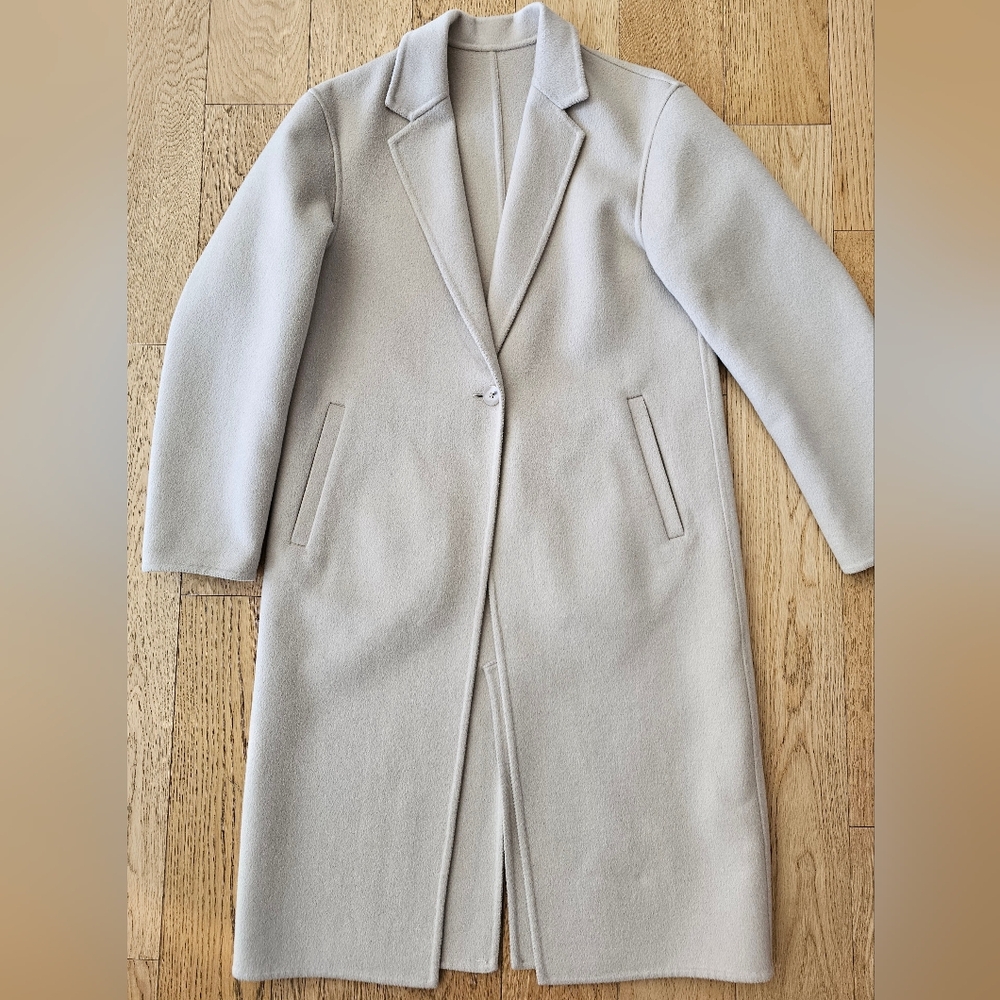 Stylish light birch color women’s coat.